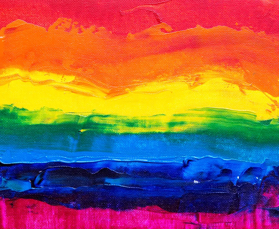 Thick bands of rainbow paint on canvas: red, orange, yellow, green, blue and purple